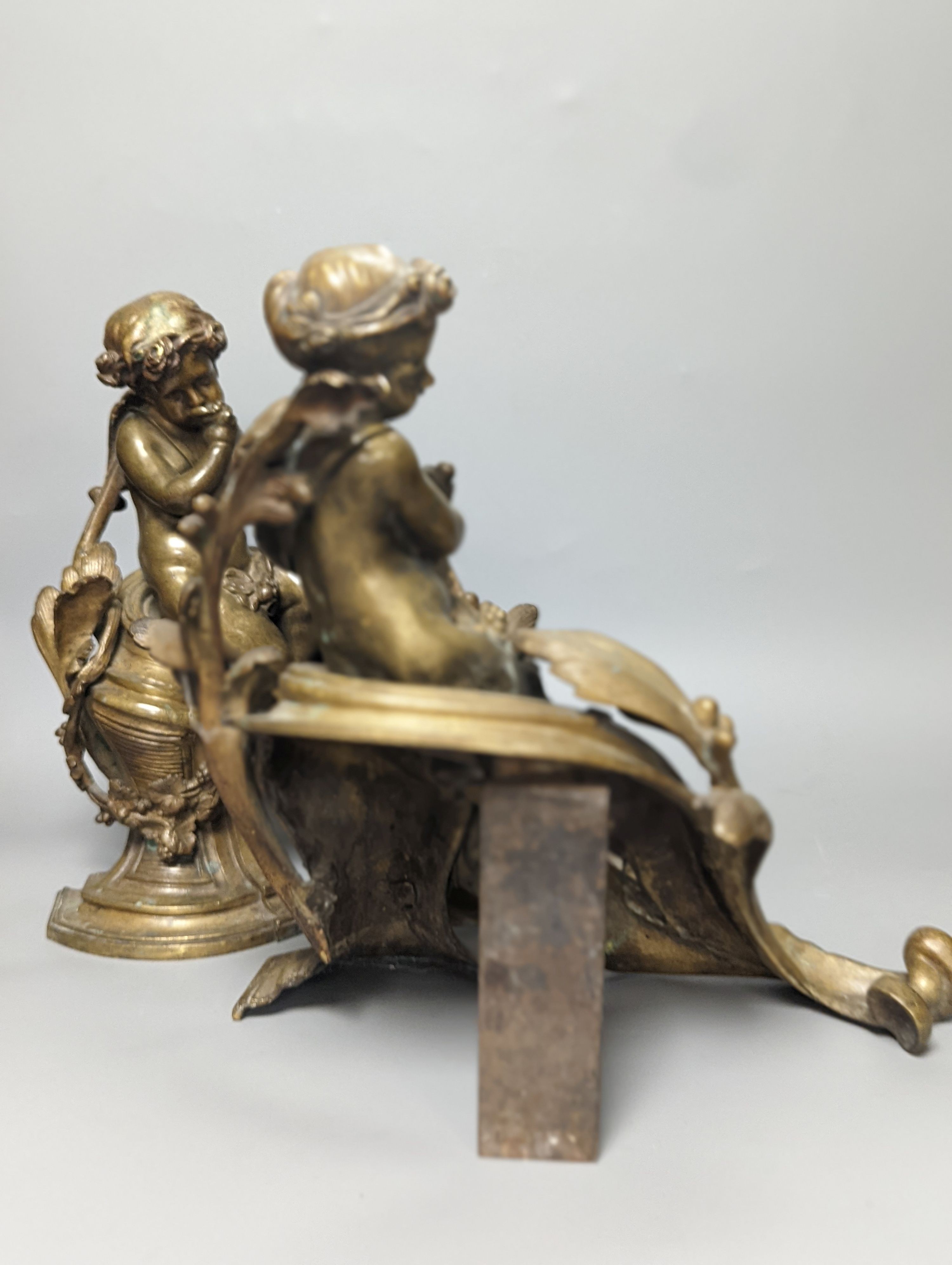 A pair of 19th century French bronze putti chenet 31cm